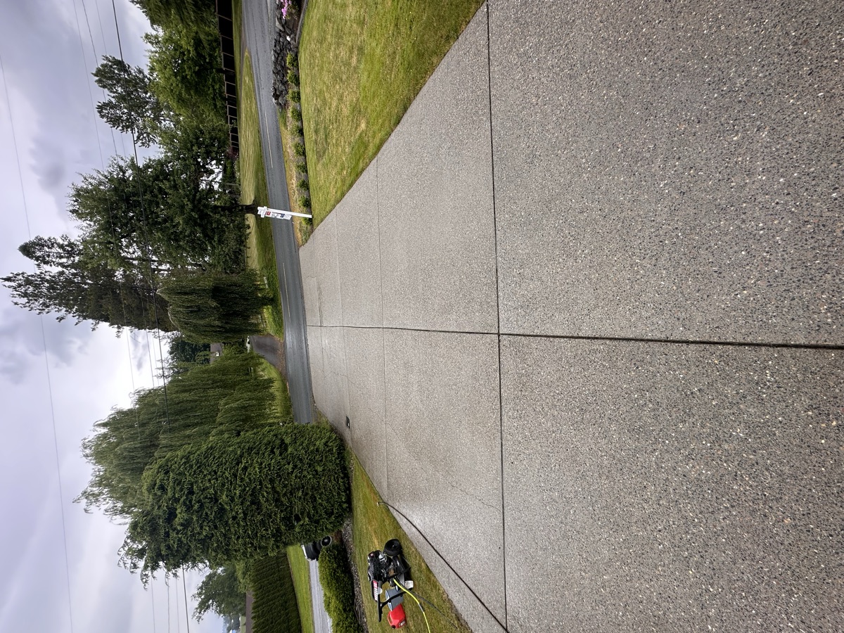 Clean concrete driveway after pressure washing in Chilliwack